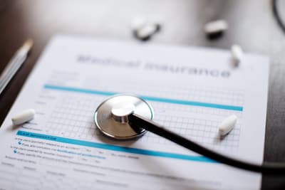stethoscope-and-health-insurance-form-2024-12-02-08-00-17-utc (1).jpg